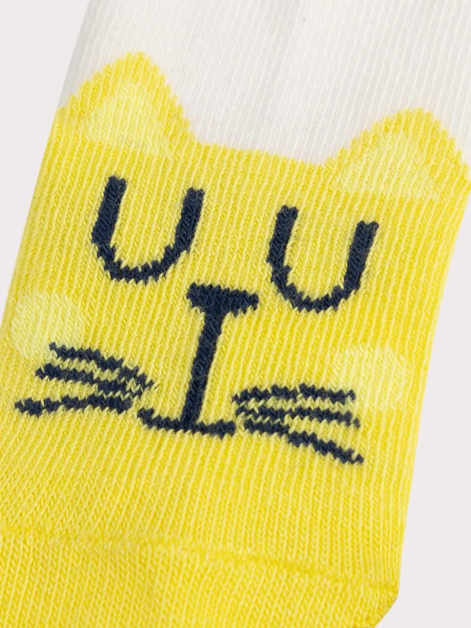 Calze beige con stampa di gatto per bebè maschio - Image 2