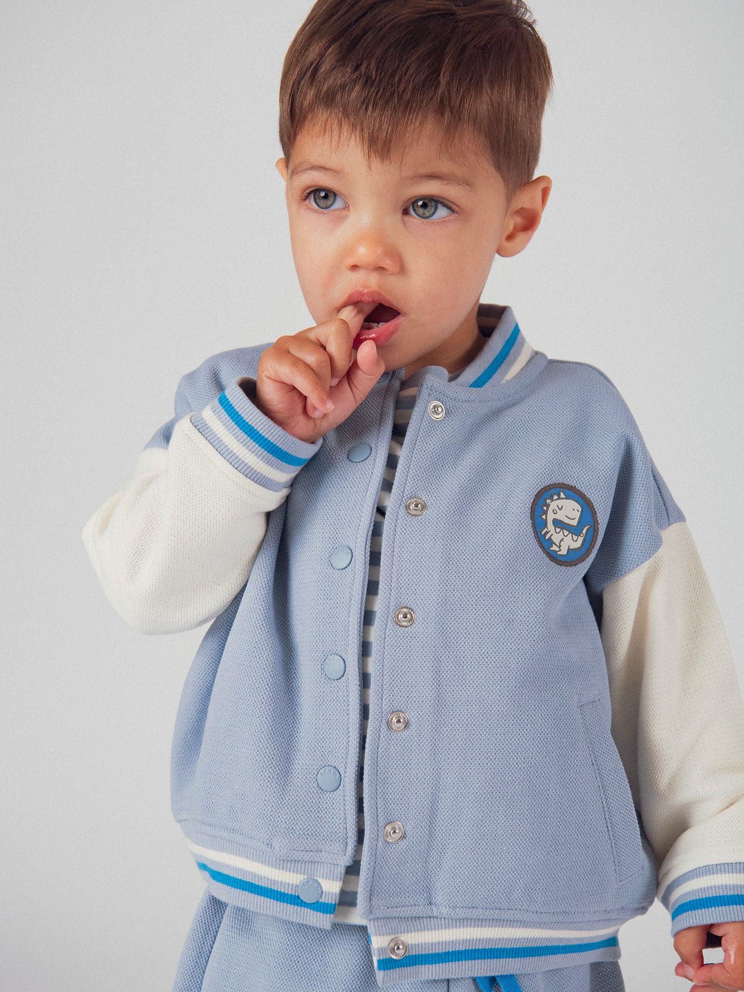 Cardigan bicolore in stile teddy per bambino - Image 3