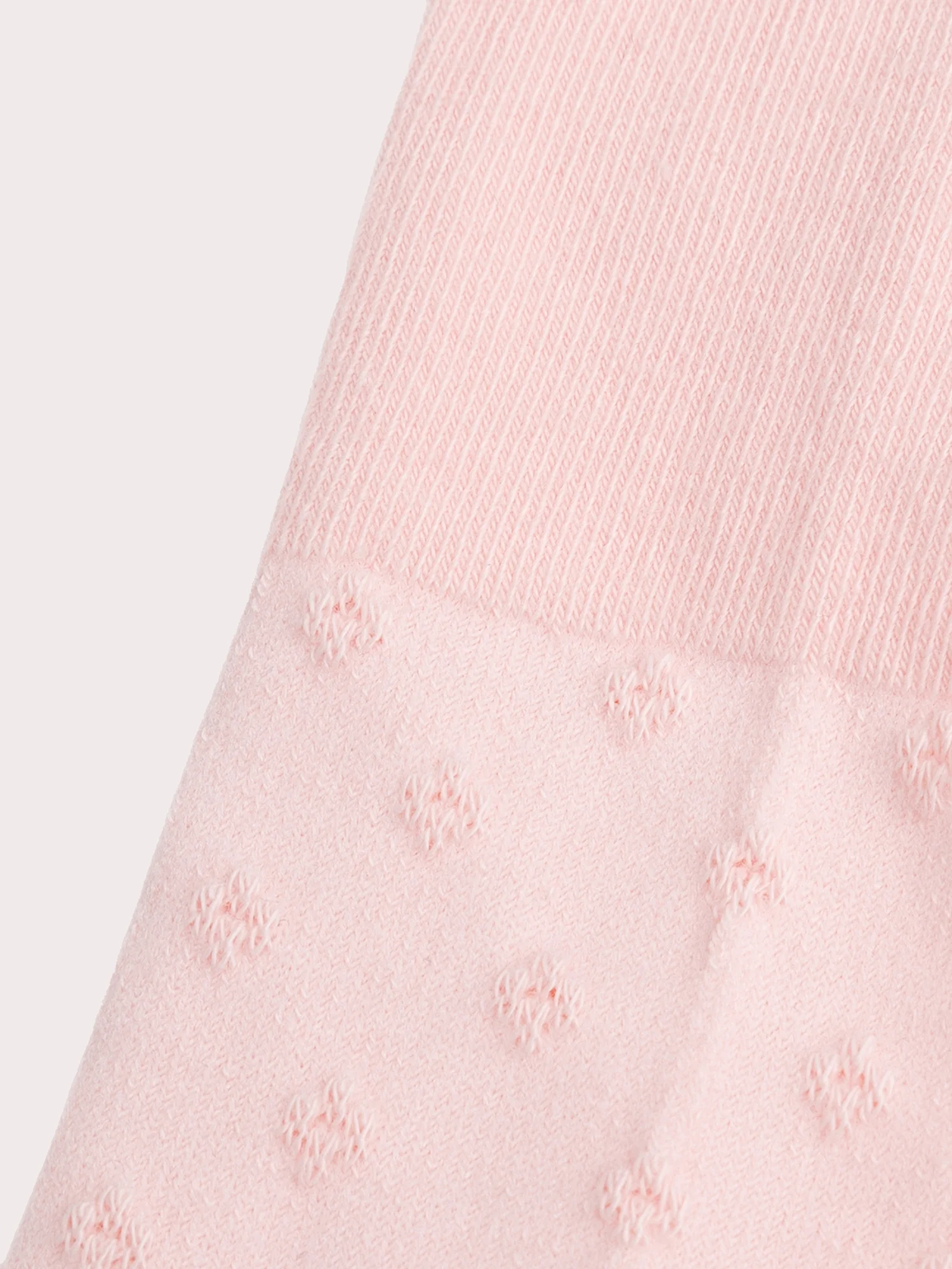 Collant rosa con motivo pointelle per bambina - Image 2