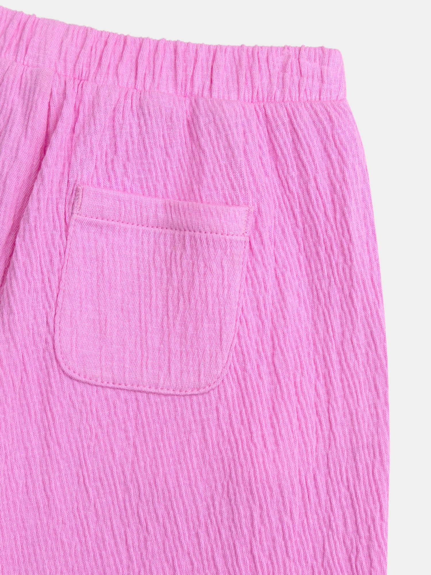 Pantaloni rosa caramella con fiocco per bambine - Image 5